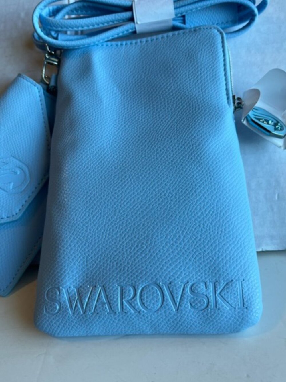 Swarovski crossbody faux leather phone bag and card wallet.